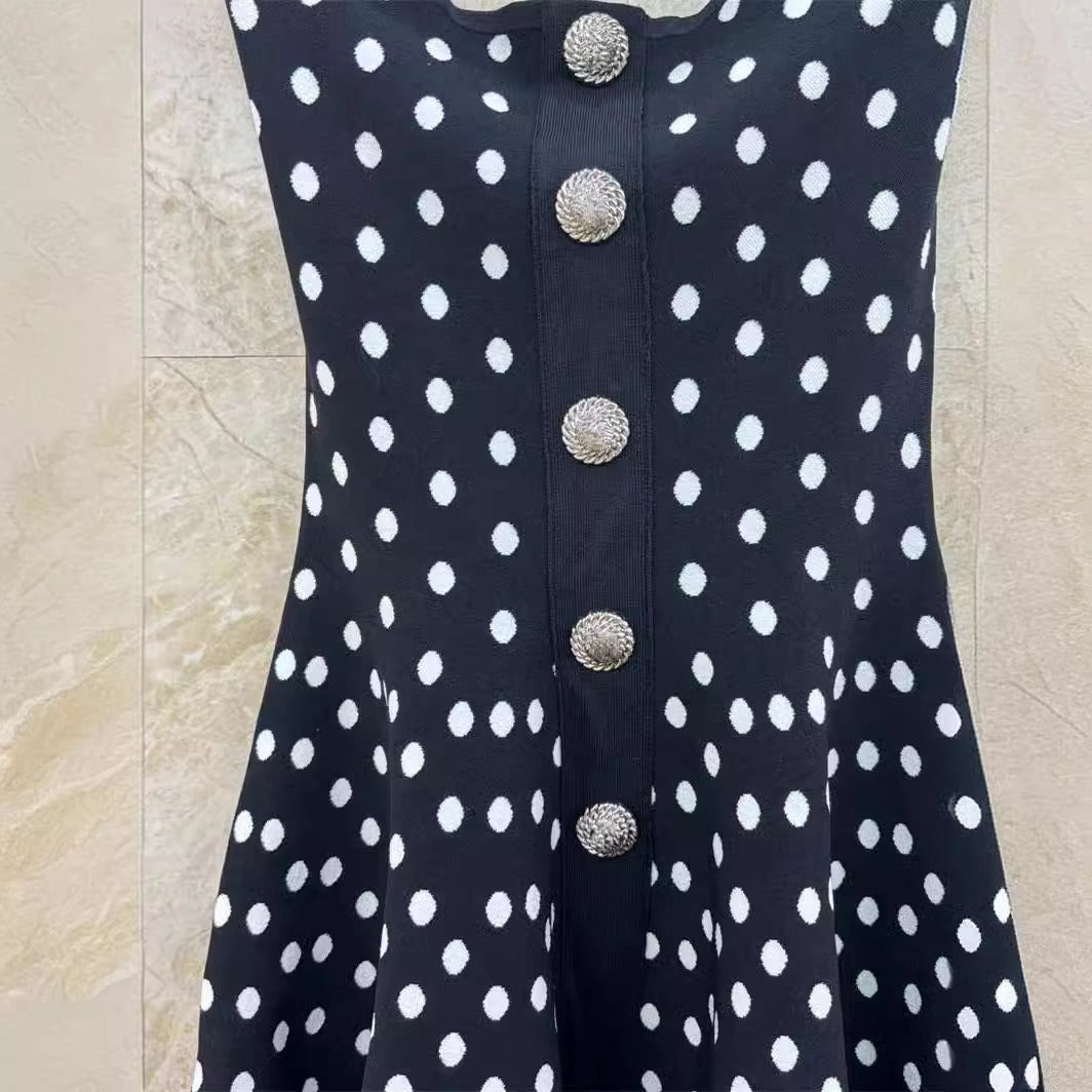A polka dot jacquard neck hanging dress